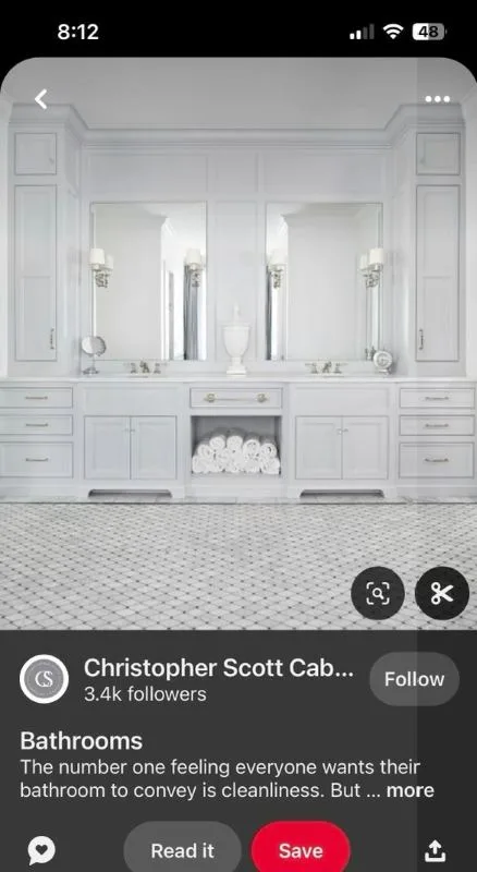 Completed vanity run with cabinetry and mosaic tiled floor