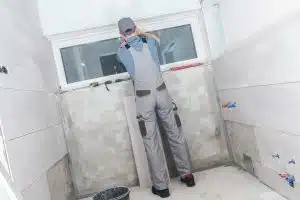 Complete Bathroom Remodel Worker
